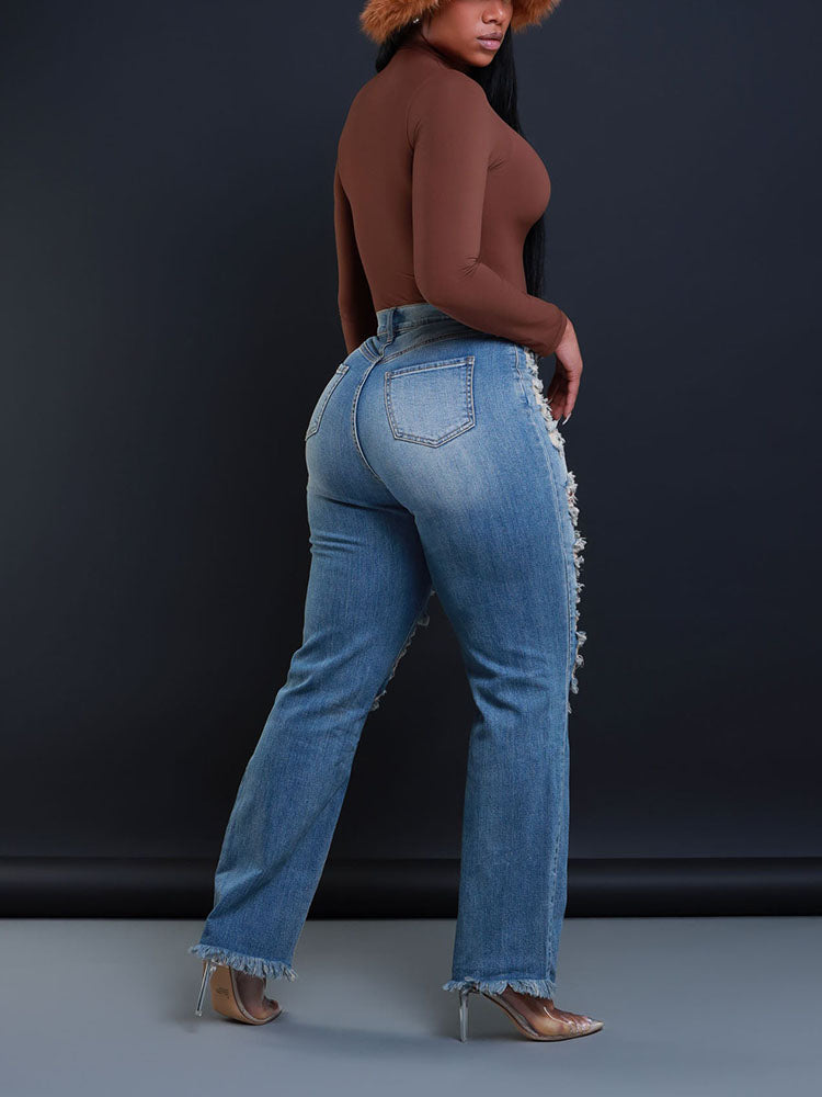 Jean asymétrique à fermeture éclair effet usé