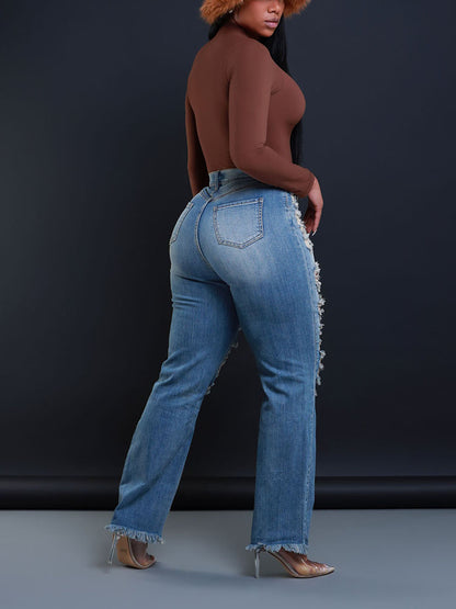 Jean asymétrique à fermeture éclair effet usé