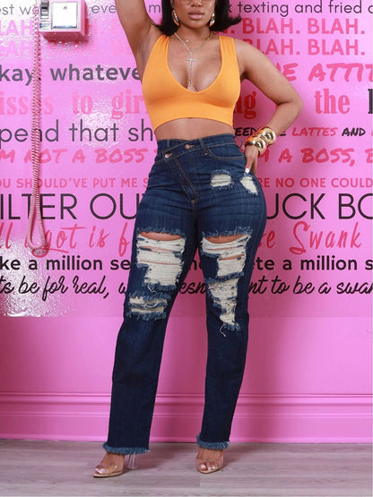 Jean asymétrique à fermeture éclair effet usé