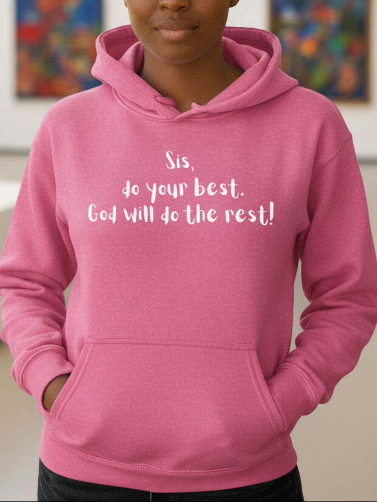 Person wearing a pink hoodie with motivational text in an indoor setting
