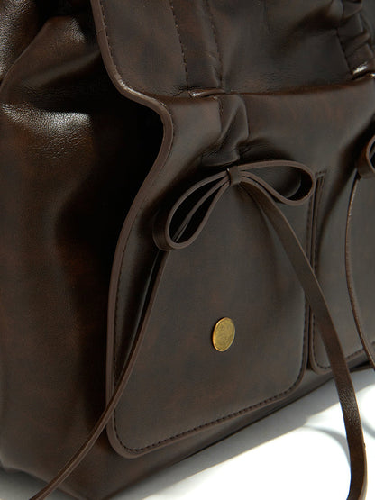 Leather Bow Backpack